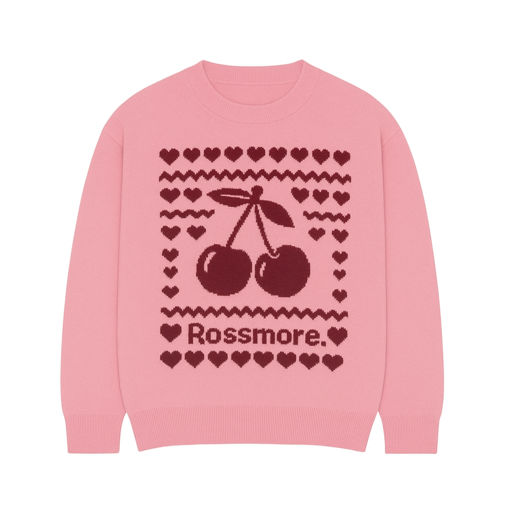 Pink sweater with cherry design and 'Rossmore' text on a white background